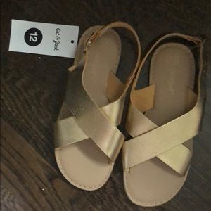 Matallic gold girls shoes.